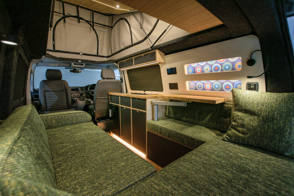 VW campervan with green cushions 