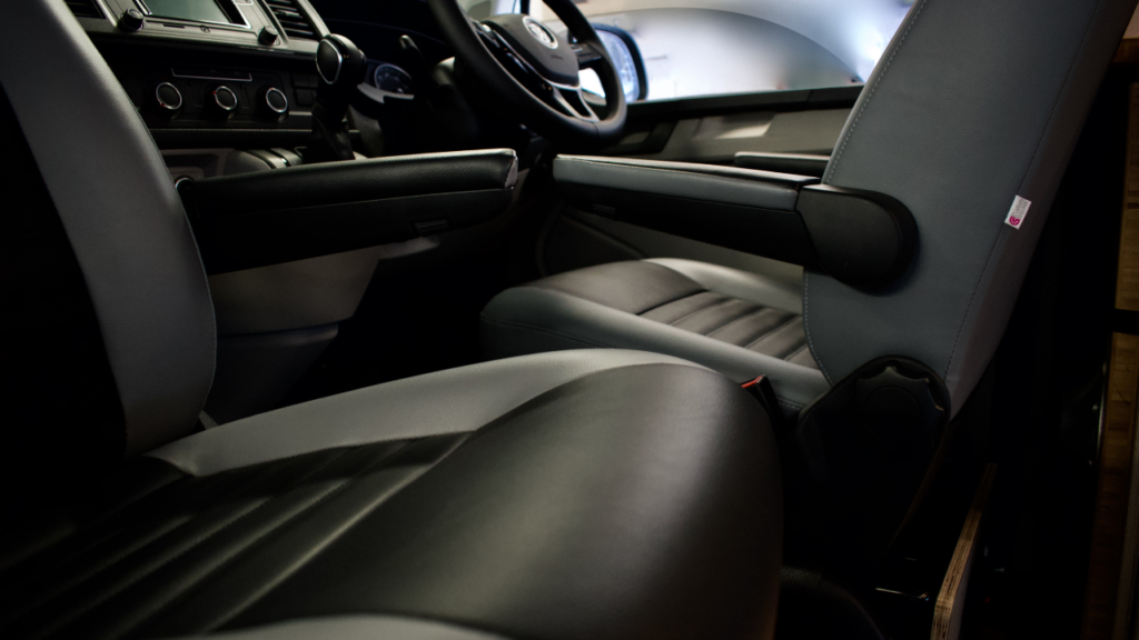 black leather interior front seat in van