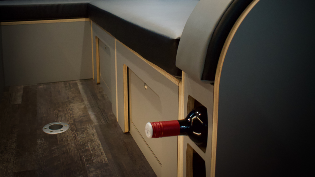 wine rack inside campervan 